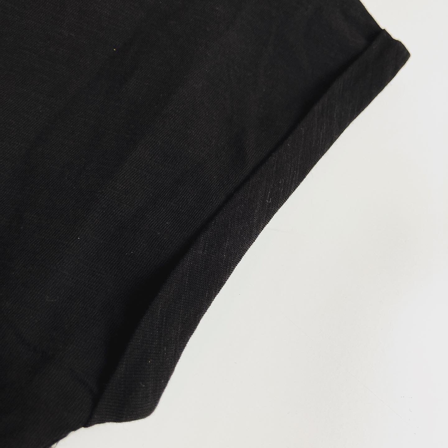 Black shirt with roll up sleeves